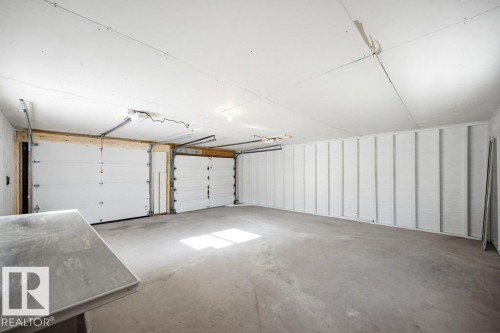 View of garage - 7016 92A Avenue, Edmonton, AB - Indoor Photo Showing Garage