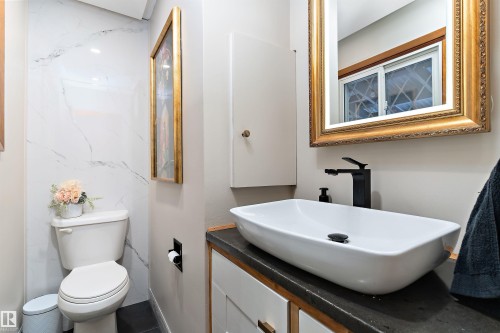 Bathroom with toilet and vanity - 7316 100 Avenue, Edmonton, AB - Indoor Photo Showing Bathroom