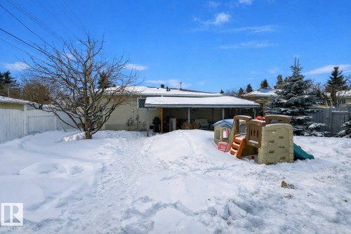View of snow covered back of property - 7316 100 Avenue, Edmonton, AB - Outdoor