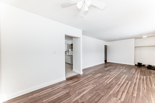 Spare room featuring wood finished floors and ceiling fan - 13904 135 Avenue, Edmonton, AB - Indoor Photo Showing Other Room