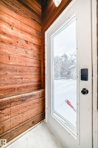 Entryway featuring wooden walls - 13904 135 Avenue, Edmonton, AB - Indoor Photo Showing Other Room