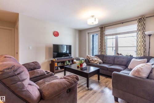 109 5029 Edgemont Boulevard, Edmonton, AB - Indoor Photo Showing Living Room