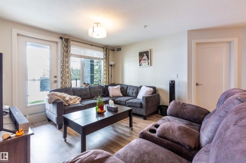 109 5029 Edgemont Boulevard, Edmonton, AB - Indoor Photo Showing Living Room