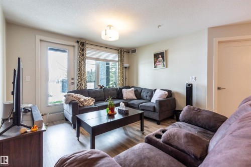 109 5029 Edgemont Boulevard, Edmonton, AB - Indoor Photo Showing Living Room