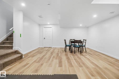 Dining space with light wood-style floors and recessed lighting - 3234 Chernowski Way, Edmonton, AB - Indoor