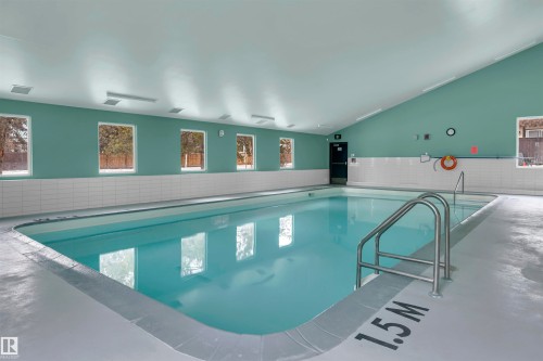 View of indoor community pool - 25 11255 31 Avenue, Edmonton, AB - Indoor Photo Showing Other Room With In Ground Pool