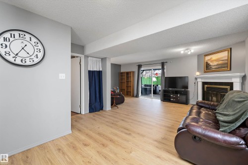 8007 160 Avenue, Edmonton, AB - Indoor Photo Showing Living Room With Fireplace