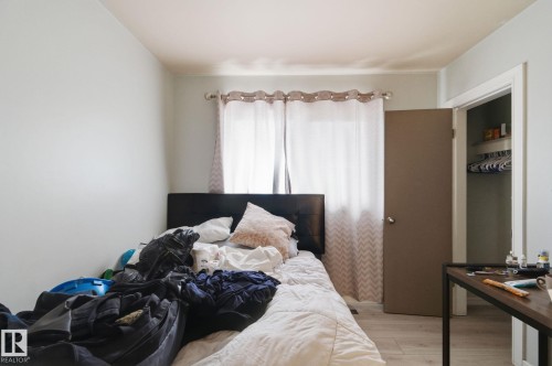 Bedroom with light wood finished floors - 13538 127 Street, Edmonton, AB - Indoor Photo Showing Bedroom
