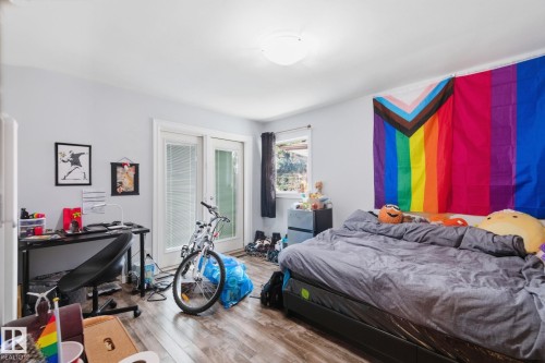 Bedroom featuring wood finished floors - 13538 127 Street, Edmonton, AB - Indoor Photo Showing Bedroom