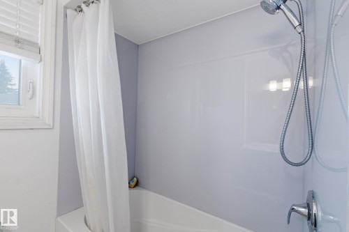 Full bathroom with shower / bathtub combination with curtain - 13538 127 Street, Edmonton, AB - Indoor Photo Showing Bathroom