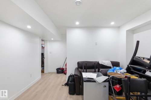 Playroom featuring light wood finished floors and recessed lighting - 13538 127 Street, Edmonton, AB - Indoor