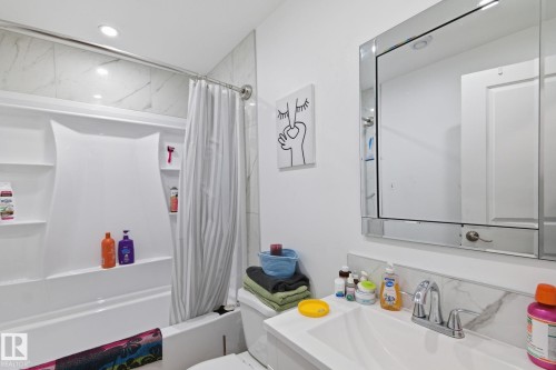 Full bath with vanity, shower / tub combo, and recessed lighting - 13538 127 Street, Edmonton, AB - Indoor Photo Showing Bathroom