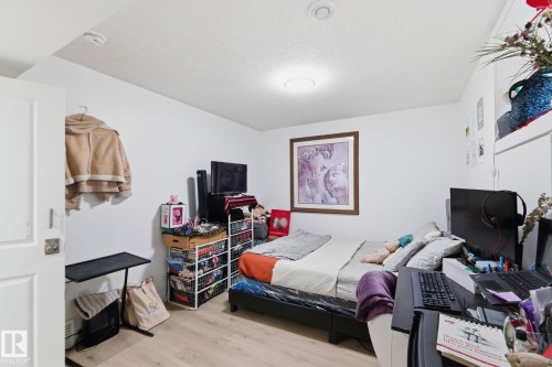 Bedroom featuring light wood-style flooring - 13538 127 Street, Edmonton, AB - Indoor Photo Showing Bedroom