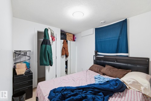 Bedroom with a closet - 13538 127 Street, Edmonton, AB - Indoor Photo Showing Bedroom