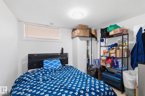Bedroom featuring a textured ceiling - 13538 127 Street, Edmonton, AB - Indoor Photo Showing Bedroom