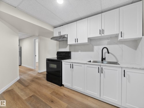 4841 114 Avenue, Edmonton, AB - Indoor Photo Showing Kitchen With Double Sink