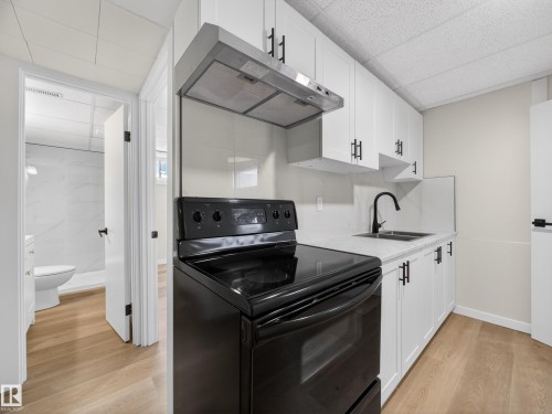 4841 114 Avenue, Edmonton, AB - Indoor Photo Showing Kitchen With Double Sink