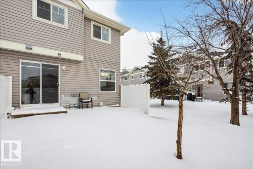 View of yard covered in snow - 47 230 Edwards Drive, Edmonton, AB - Outdoor