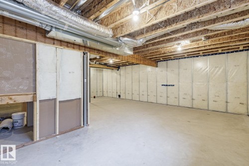 View of unfinished below grade area - 75 Dansereau Way, Beaumont, AB - Indoor Photo Showing Basement