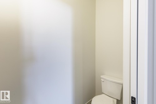 Bathroom with toilet - 75 Dansereau Way, Beaumont, AB - Indoor Photo Showing Bathroom