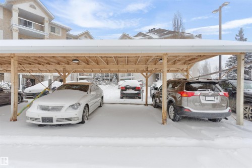 Snow covered parking with covered parking - 312 11620 9A Avenue, Edmonton, AB - Outdoor