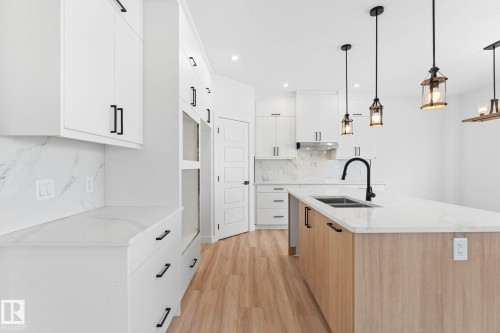 5252 47 Avenue, Calmar, AB - Indoor Photo Showing Kitchen With Double Sink With Upgraded Kitchen