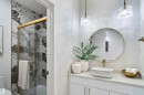 Full bath with a marble finish shower and vanity - 7026 Kiviaq Crescent, Edmonton, AB  - Indoor Photo Showing Bathroom 
