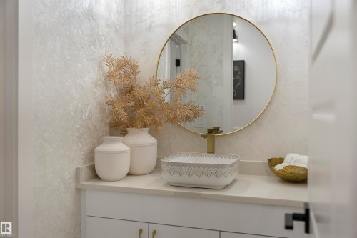 Bathroom view of vanity and wallpapered walls - 7026 Kiviaq Crescent, Edmonton, AB - Indoor Photo Showing Bathroom