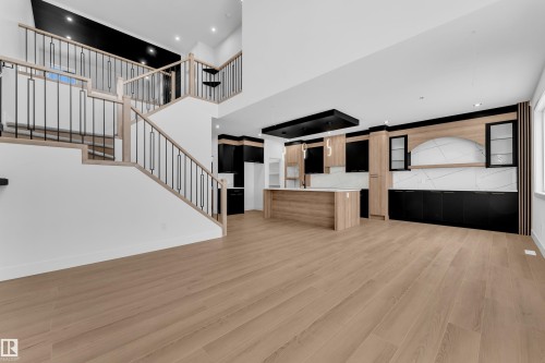 Unfurnished living room featuring recessed lighting and light wood-style floors - 741 Astoria Way, Devon, AB - Indoor Photo Showing Other Room