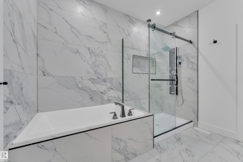 Full bathroom featuring a marble finish shower, a bath, light marble finish flooring, and recessed lighting - 741 Astoria Way, Devon, AB - Indoor Photo Showing Bathroom