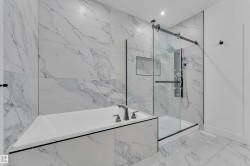 Full bathroom featuring a marble finish shower, a bath, light marble finish flooring, and recessed lighting - 