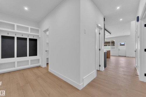 Hallway with recessed lighting and light wood finished floors - 741 Astoria Way, Devon, AB - Indoor Photo Showing Other Room