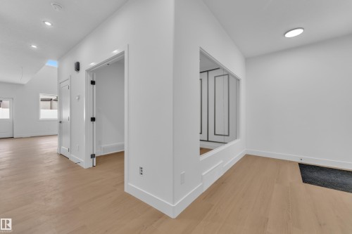 Corridor featuring light wood-style floors and recessed lighting - 741 Astoria Way, Devon, AB - Indoor Photo Showing Other Room