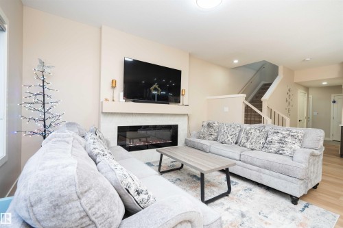 1459 Cherniak Way, Edmonton, AB - Indoor Photo Showing Living Room With Fireplace