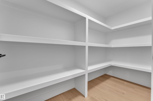 View of pantry - 215 Basin Court, Leduc, AB - Indoor With Storage