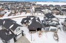 Snowy aerial view with a residential view - 215 Basin Court, Leduc, AB  - Outdoor 