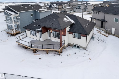 Snowy aerial view with a residential view - 215 Basin Court, Leduc, AB - Outdoor