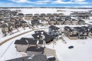 Snowy aerial view with a residential view - 215 Basin Court, Leduc, AB  - Outdoor With View 
