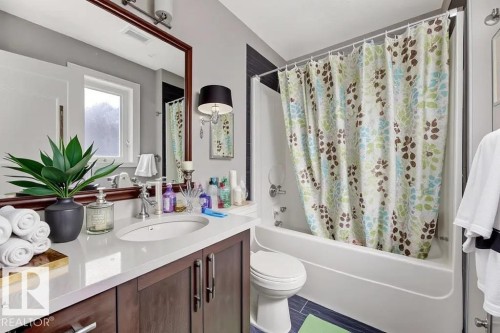 Full bath with vanity and shower / bathtub combination with curtain - 10806 72 Avenue, Edmonton, AB - Indoor Photo Showing Bathroom