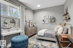 Bedroom with wood finished floors - 
