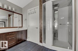 Bathroom with vanity and a stall shower - 