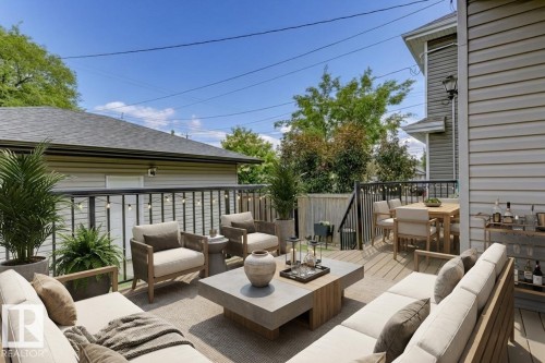 View of patio / terrace with outdoor lounge area and a deck - 10806 72 Avenue, Edmonton, AB - Outdoor With Deck Patio Veranda With Exterior