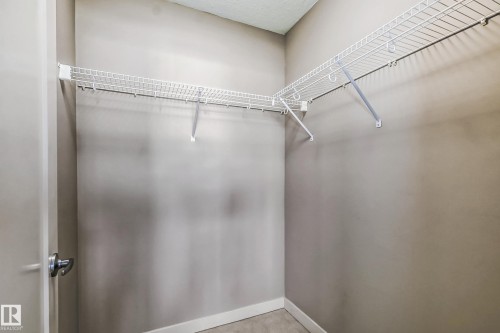 View of walk in closet - 1669 Hammond Crescent, Edmonton, AB - Indoor With Storage