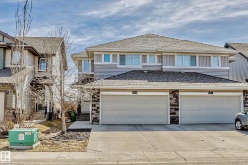 View of front of home featuring roof with shingles, concrete driveway, and an attached garage - 1669 Hammond Crescent, Edmonton, AB - Outdoor With Facade
