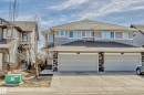 View of front of home featuring roof with shingles, concrete driveway, and an attached garage - 1669 Hammond Crescent, Edmonton, AB  - Outdoor With Facade 