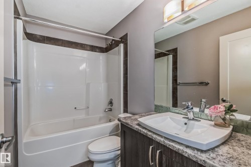 Full bath with vanity and bathing tub / shower combination - 1669 Hammond Crescent, Edmonton, AB - Indoor Photo Showing Bathroom