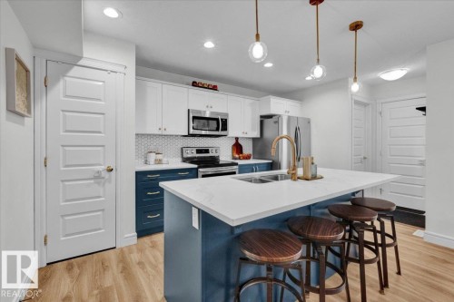 6489 King Wynd, Edmonton, AB - Indoor Photo Showing Kitchen With Stainless Steel Kitchen With Double Sink With Upgraded Kitchen