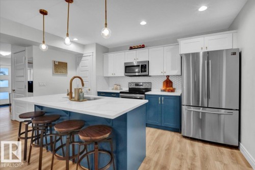 6489 King Wynd, Edmonton, AB - Indoor Photo Showing Kitchen With Stainless Steel Kitchen With Upgraded Kitchen