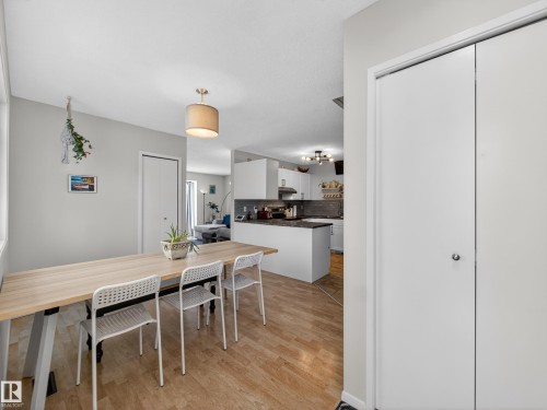 Dining room with light wood-type flooring - 4603 32 Avenue, Edmonton, AB - Indoor Photo Showing Dining Room