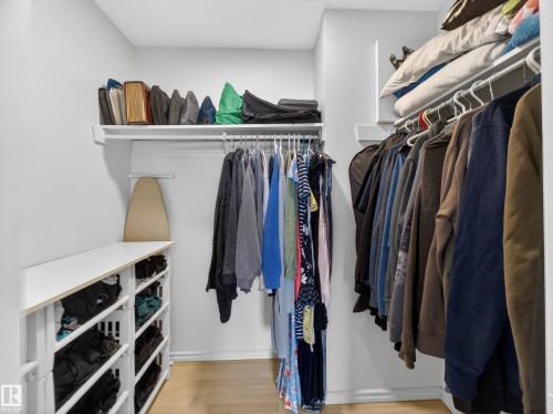Walk in closet featuring light wood-style flooring - 4603 32 Avenue, Edmonton, AB - Indoor With Storage